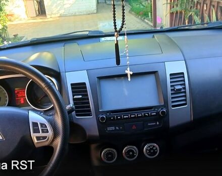 Черный Мицубиси Аутлендер, объемом двигателя 2.4 л и пробегом 184 тыс. км за 7500 $, фото 7 на Automoto.ua