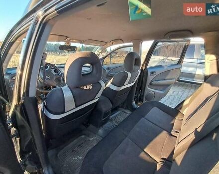 Черный Мицубиси Аутлендер, объемом двигателя 2 л и пробегом 190 тыс. км за 8000 $, фото 7 на Automoto.ua