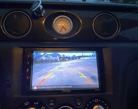 Чорний Міцубісі Аутлендер, об'ємом двигуна 2 л та пробігом 271 тис. км за 6799 $, фото 7 на Automoto.ua