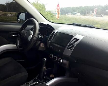 Черный Мицубиси Аутлендер, объемом двигателя 2.4 л и пробегом 180 тыс. км за 8900 $, фото 5 на Automoto.ua