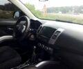 Черный Мицубиси Аутлендер, объемом двигателя 2.4 л и пробегом 180 тыс. км за 8900 $, фото 5 на Automoto.ua