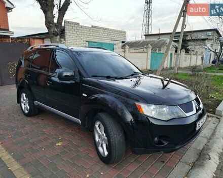 Черный Мицубиси Аутлендер, объемом двигателя 2.36 л и пробегом 192 тыс. км за 8800 $, фото 5 на Automoto.ua