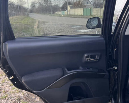 Чорний Міцубісі Аутлендер, об'ємом двигуна 2.36 л та пробігом 293 тис. км за 7900 $, фото 13 на Automoto.ua