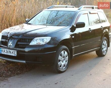Черный Мицубиси Аутлендер, объемом двигателя 2 л и пробегом 189 тыс. км за 7200 $, фото 27 на Automoto.ua
