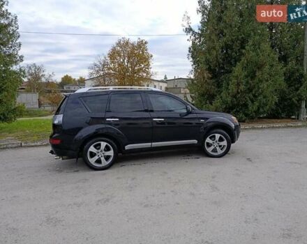 Черный Мицубиси Аутлендер, объемом двигателя 2.2 л и пробегом 200 тыс. км за 9500 $, фото 3 на Automoto.ua