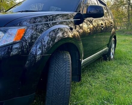 Чорний Міцубісі Аутлендер, об'ємом двигуна 2.4 л та пробігом 214 тис. км за 9800 $, фото 1 на Automoto.ua