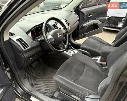 Черный Мицубиси Аутлендер, объемом двигателя 2.4 л и пробегом 185 тыс. км за 7900 $, фото 14 на Automoto.ua