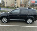 Черный Мицубиси Аутлендер, объемом двигателя 1.97 л и пробегом 244 тыс. км за 8800 $, фото 6 на Automoto.ua