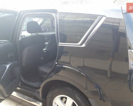 Чорний Міцубісі Аутлендер, об'ємом двигуна 2.36 л та пробігом 277 тис. км за 8500 $, фото 5 на Automoto.ua