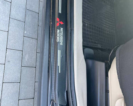 Чорний Міцубісі Аутлендер, об'ємом двигуна 2.4 л та пробігом 195 тис. км за 8600 $, фото 13 на Automoto.ua