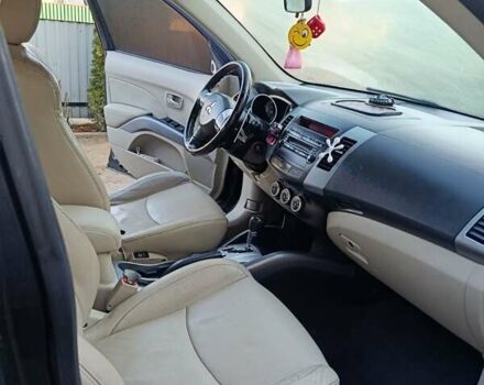 Черный Мицубиси Аутлендер, объемом двигателя 2.36 л и пробегом 203 тыс. км за 9200 $, фото 9 на Automoto.ua