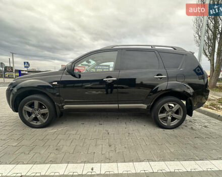 Чорний Міцубісі Аутлендер, об'ємом двигуна 2.4 л та пробігом 218 тис. км за 10000 $, фото 9 на Automoto.ua