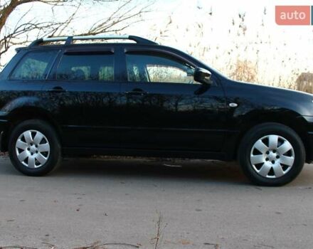 Черный Мицубиси Аутлендер, объемом двигателя 2 л и пробегом 189 тыс. км за 7200 $, фото 44 на Automoto.ua