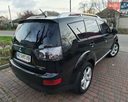 Черный Мицубиси Аутлендер, объемом двигателя 2.36 л и пробегом 192 тыс. км за 8800 $, фото 6 на Automoto.ua