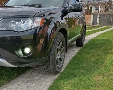 Черный Мицубиси Аутлендер, объемом двигателя 2.35 л и пробегом 245 тыс. км за 8000 $, фото 23 на Automoto.ua