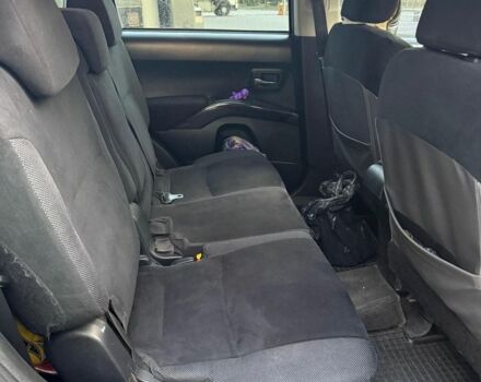 Черный Мицубиси Аутлендер, объемом двигателя 2.4 л и пробегом 369 тыс. км за 8500 $, фото 6 на Automoto.ua