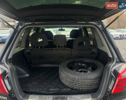 Черный Мицубиси Аутлендер, объемом двигателя 2 л и пробегом 240 тыс. км за 5500 $, фото 11 на Automoto.ua