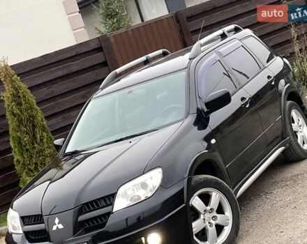 Черный Мицубиси Аутлендер, объемом двигателя 2.4 л и пробегом 178 тыс. км за 6900 $, фото 8 на Automoto.ua