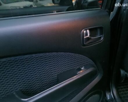 Черный Мицубиси Аутлендер, объемом двигателя 2 л и пробегом 271 тыс. км за 6940 $, фото 17 на Automoto.ua