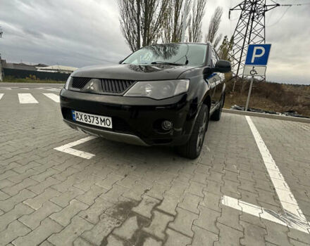 Чорний Міцубісі Аутлендер, об'ємом двигуна 2.4 л та пробігом 218 тис. км за 10000 $, фото 12 на Automoto.ua