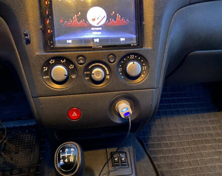 Чорний Міцубісі Аутлендер, об'ємом двигуна 2 л та пробігом 271 тис. км за 6799 $, фото 13 на Automoto.ua