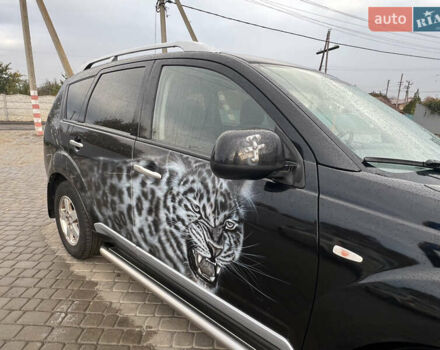 Міцубісі Аутлендер 2008 у Кременчуге на Automoto.ua Чорний Міцубісі Аутлендер, об'ємом двигуна 2.4 л та пробігом 230 тис. км за 6650 $, фото 61 на Automoto.ua