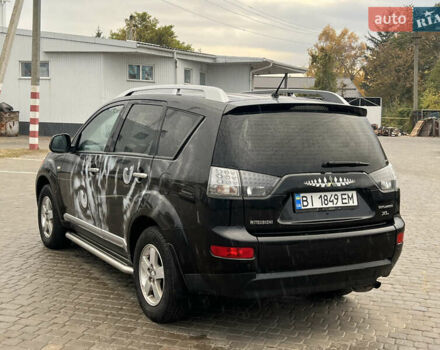Мицубиси Аутлендер 2008 в Кременчуге на Automoto.ua Черный Мицубиси Аутлендер, объемом двигателя 2.4 л и пробегом 230 тыс. км за 6850 $, фото 25 на Automoto.ua
