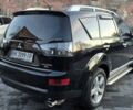 Чорний Міцубісі Аутлендер, об'ємом двигуна 2.4 л та пробігом 230 тис. км за 9700 $, фото 4 на Automoto.ua