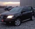 Черный Мицубиси Аутлендер, объемом двигателя 2 л и пробегом 271 тыс. км за 6940 $, фото 1 на Automoto.ua