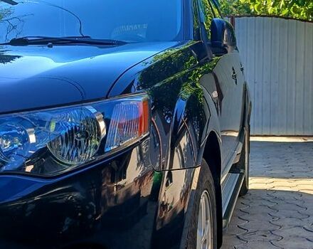 Черный Мицубиси Аутлендер, объемом двигателя 2.4 л и пробегом 184 тыс. км за 7500 $, фото 3 на Automoto.ua