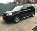 Чорний Міцубісі Аутлендер, об'ємом двигуна 2.38 л та пробігом 207 тис. км за 7000 $, фото 1 на Automoto.ua