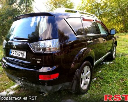 Чорний Міцубісі Аутлендер, об'ємом двигуна 3 л та пробігом 284 тис. км за 10000 $, фото 1 на Automoto.ua