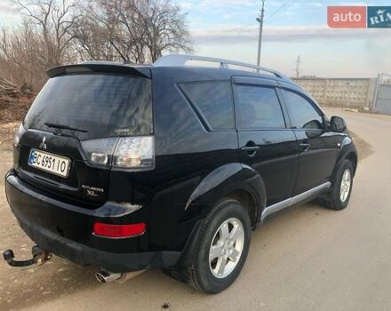 Черный Мицубиси Аутлендер, объемом двигателя 2.4 л и пробегом 290 тыс. км за 8600 $, фото 4 на Automoto.ua