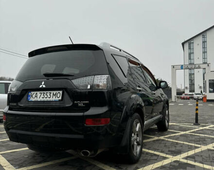 Черный Мицубиси Аутлендер, объемом двигателя 2.36 л и пробегом 120 тыс. км за 10100 $, фото 5 на Automoto.ua