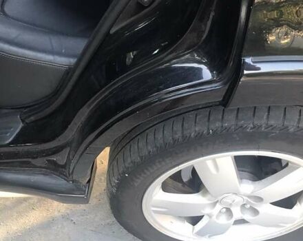 Чорний Міцубісі Аутлендер, об'ємом двигуна 2.38 л та пробігом 207 тис. км за 7000 $, фото 62 на Automoto.ua