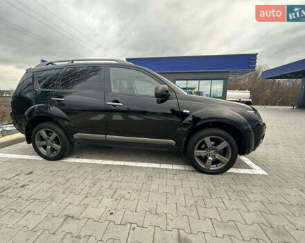 Чорний Міцубісі Аутлендер, об'ємом двигуна 2.4 л та пробігом 218 тис. км за 10000 $, фото 10 на Automoto.ua