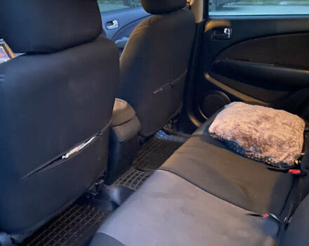 Чорний Міцубісі Аутлендер, об'ємом двигуна 2 л та пробігом 271 тис. км за 6799 $, фото 9 на Automoto.ua