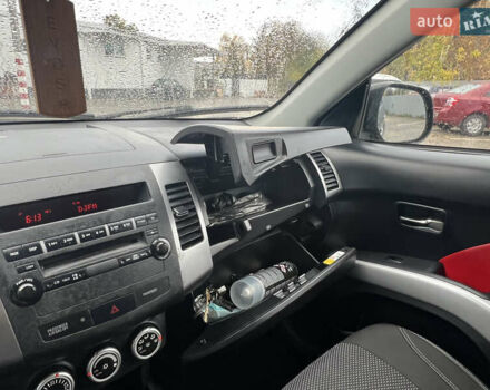 Черный Мицубиси Аутлендер, объемом двигателя 2.4 л и пробегом 230 тыс. км за 6650 $, фото 40 на Automoto.ua