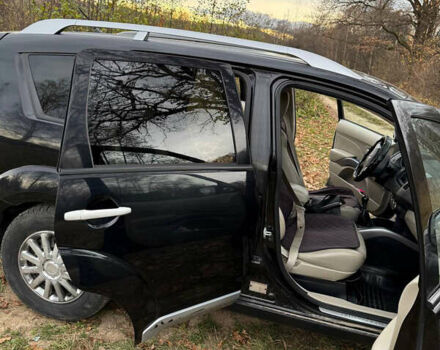 Черный Мицубиси Аутлендер, объемом двигателя 2.18 л и пробегом 233 тыс. км за 9600 $, фото 7 на Automoto.ua