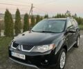 Черный Мицубиси Аутлендер, объемом двигателя 2.2 л и пробегом 310 тыс. км за 9700 $, фото 1 на Automoto.ua