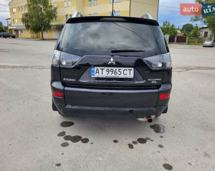 Чорний Міцубісі Аутлендер, об'ємом двигуна 2.4 л та пробігом 205 тис. км за 8400 $, фото 14 на Automoto.ua