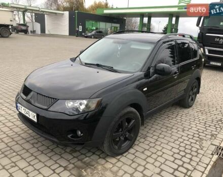 Чорний Міцубісі Аутлендер, об'ємом двигуна 2.4 л та пробігом 199 тис. км за 8999 $, фото 6 на Automoto.ua