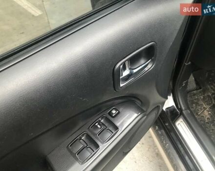 Чорний Міцубісі Аутлендер, об'ємом двигуна 2.38 л та пробігом 207 тис. км за 7000 $, фото 19 на Automoto.ua