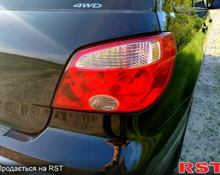 Чорний Міцубісі Аутлендер, об'ємом двигуна 2 л та пробігом 143 тис. км за 8200 $, фото 1 на Automoto.ua