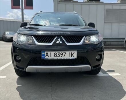 Чорний Міцубісі Аутлендер, об'ємом двигуна 2.4 л та пробігом 137 тис. км за 8700 $, фото 1 на Automoto.ua