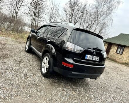 Чорний Міцубісі Аутлендер, об'ємом двигуна 2.4 л та пробігом 229 тис. км за 9790 $, фото 4 на Automoto.ua