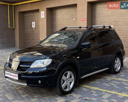 Черный Мицубиси Аутлендер, объемом двигателя 2 л и пробегом 270 тыс. км за 7199 $, фото 6 на Automoto.ua