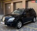 Черный Мицубиси Аутлендер, объемом двигателя 2 л и пробегом 270 тыс. км за 7199 $, фото 6 на Automoto.ua