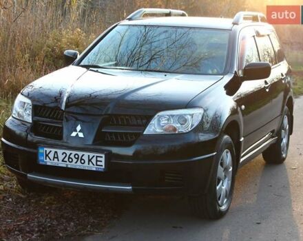 Черный Мицубиси Аутлендер, объемом двигателя 2 л и пробегом 189 тыс. км за 7200 $, фото 12 на Automoto.ua