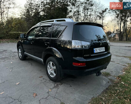 Чорний Міцубісі Аутлендер, об'ємом двигуна 1.97 л та пробігом 300 тис. км за 8600 $, фото 5 на Automoto.ua